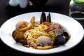 Pasta spaghetti seafood with mussels and shrimps and tomatoes, with parsley Royalty Free Stock Photo