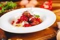 Italian pasta. Spaghetti with tomato sauce and meatballs on white plate with parmesan cheese, fresh parsley and tomatoes. Royalty Free Stock Photo