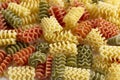 Italian pasta of spiral shaped on white