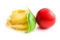 Italian pasta tagliatelle, tomato and basil leaf