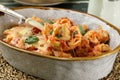 Italian pasta tortellini with tomato sauce and mozzarella cheese Royalty Free Stock Photo