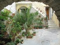 Italian patio with many potted plants and stairway Royalty Free Stock Photo