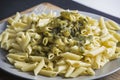 Italian penne pasta with green pesto sauce Royalty Free Stock Photo