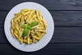 Italian penne pasta with sauce pesto Royalty Free Stock Photo