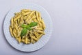 Italian penne pasta with sauce pesto Royalty Free Stock Photo