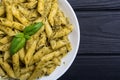 Italian penne pasta with sauce pesto