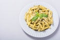 Italian penne pasta with sauce pesto Food background Royalty Free Stock Photo