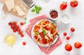 Italian penne pasta with tomatoes parmesan basil