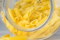 Italian Penne Rigate Macaroni Pasta, raw food, close up Royalty Free Stock Photo