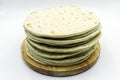 Italian piadina, flat bread. Vertical view, white background