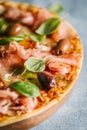 Italian pizza on blue rustic textile Royalty Free Stock Photo