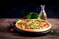 Italian pizza with chicken, salami, zucchini, tomatoes and herbs Royalty Free Stock Photo