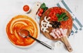 Italian pizza cooking process on white table. Backstage of preparation. Process step by step. Pizza dough and ingredients. Royalty Free Stock Photo