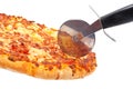 Italian pizza and cutter Royalty Free Stock Photo