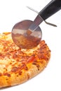 Italian pizza and cutter Royalty Free Stock Photo