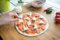 Italian pizza making hands from above