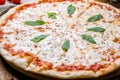 Italian pizza Margherita with cheese and oregano Royalty Free Stock Photo