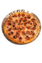 Italian pizza with salami olives and tomato. A series of different types of pizza for menus photographed from one angle Royalty Free Stock Photo