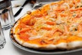 Italian pizza with salmon topping Royalty Free Stock Photo