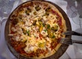 Italian pizza seafood on a plate