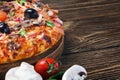 Italian pizza served on wooden table Royalty Free Stock Photo