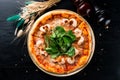 italian pizza shrimp and chard leaves top view, flat lay