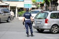 Italian Policeman in Uniform Controlling Road Traffic in The Cit