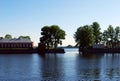 Italian pond with access to the Merchant Harbor. The building of the `Dutch kitchen` and trees at sunset.