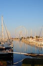 Italian port with little yachts and ferris wheel