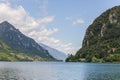 Italian prealpine lake Lago d`Idro surrounded by high cliffs overgrown with dense forest. Brescia, Lombardy, Italy Royalty Free Stock Photo