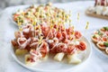 Italian prosciutto ,raw ham leg sliced Royalty Free Stock Photo