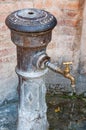 Italian public water fountain in a small village of Italy