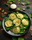 Italian ravioli pasta stuffed with spinach, creamy ricotta cheese, walnuts. Healthy Vegetarian food Royalty Free Stock Photo