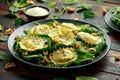 Italian ravioli pasta stuffed with spinach, creamy ricotta cheese, walnuts. Healthy Vegetarian food Royalty Free Stock Photo