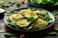 Italian ravioli pasta stuffed with spinach, creamy ricotta cheese, walnuts. Healthy Vegetarian food Royalty Free Stock Photo