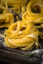 Italian raw homemade pasta tagliatelle. Royalty Free Stock Photo