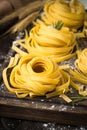 Italian raw homemade pasta tagliatelle. Royalty Free Stock Photo