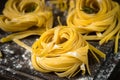 Italian raw homemade pasta tagliatelle. Royalty Free Stock Photo