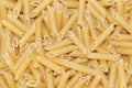 Italian raw macaroni background or texture Royalty Free Stock Photo