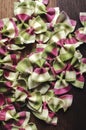 Italian raw multicolored farfalle pasta