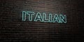 ITALIAN -Realistic Neon Sign on Brick Wall background - 3D rendered royalty free stock image