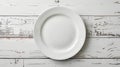 Italian restaurant ambiance empty white plate on stylishly adorned table top down view Royalty Free Stock Photo