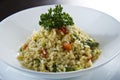 Italian rice arborio risotto with leek on white table Royalty Free Stock Photo