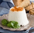 Italian ricotta cheese and homemade bread and basil