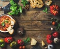 Italian roasted tomato and garlic soup with bread, basil, parmesan Royalty Free Stock Photo