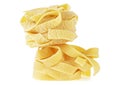 Italian rolled fresh fettuccine pasta isolated on white background Royalty Free Stock Photo