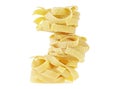 Italian rolled fresh fettuccine pasta isolated on white background Royalty Free Stock Photo