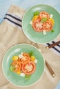 Italian salad tomatoes mozzarella cheese top view, Rustic style Royalty Free Stock Photo