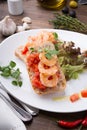 Italian sandwich bruschetta with shrimps served on white plate Royalty Free Stock Photo