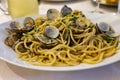 Italian sea food dinner first course pasta with clams alle vongole Royalty Free Stock Photo